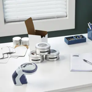 DYMO Omega Embossing Label Maker | Small Label Maker with Turn-Click Wheel and Ergonomic Design | For HomeDIY & Crafting (£/€ÄÖ & Ü), Direct thermal, Blue