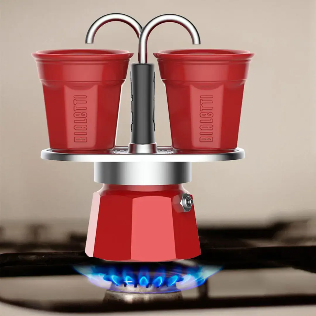 "Bialetti Mini Express" kavos aparatas raudonas 2tz + 2 puodeliai